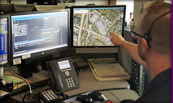 Dispatcher Looking at a Map on His Computer Screen